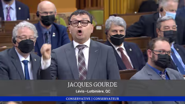 Jacques Gourde, qui se donne une swing Image principale